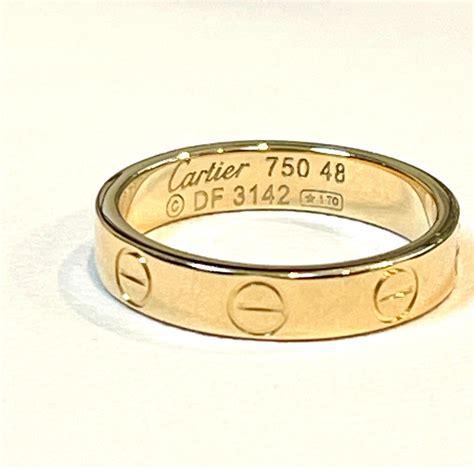 52833a cartier 750 ring.